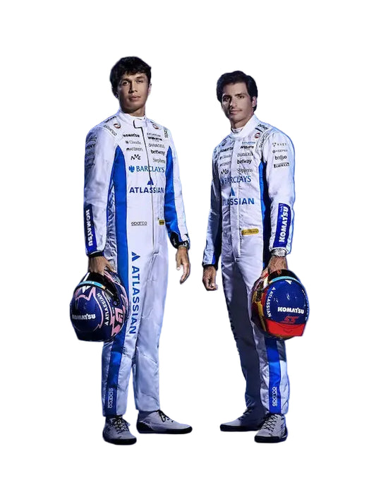 Two individuals in racing suits holding helmets on a white background