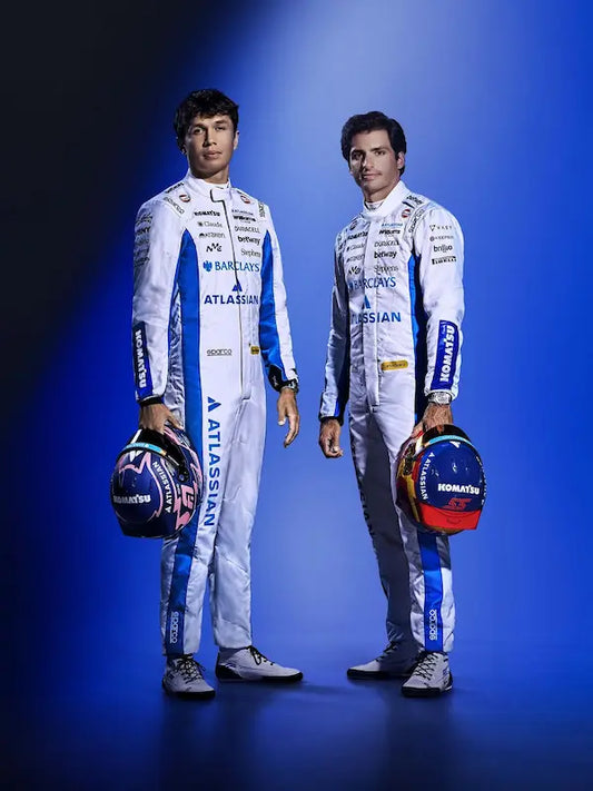 Both Williams F1 replica suits displayed, showcasing the team's blue and black colors.