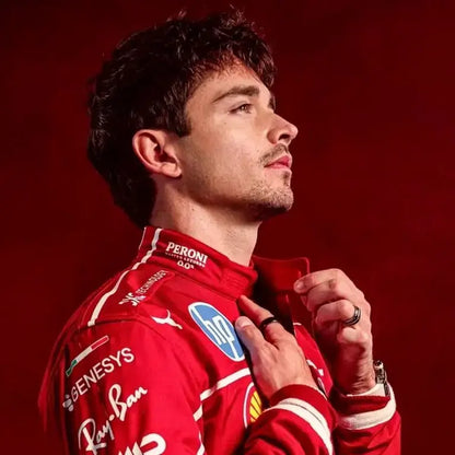 Charles Leclerc wearing the 2025 Scuderia Ferrari F1 Team replica suit in iconic red with sponsor logos