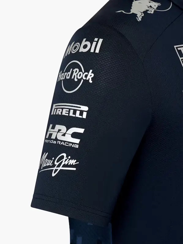 Model wearing the Hypebeast Red Bull Racing polo in an urban setting, pairing motorsport heritage with streetwear fashion