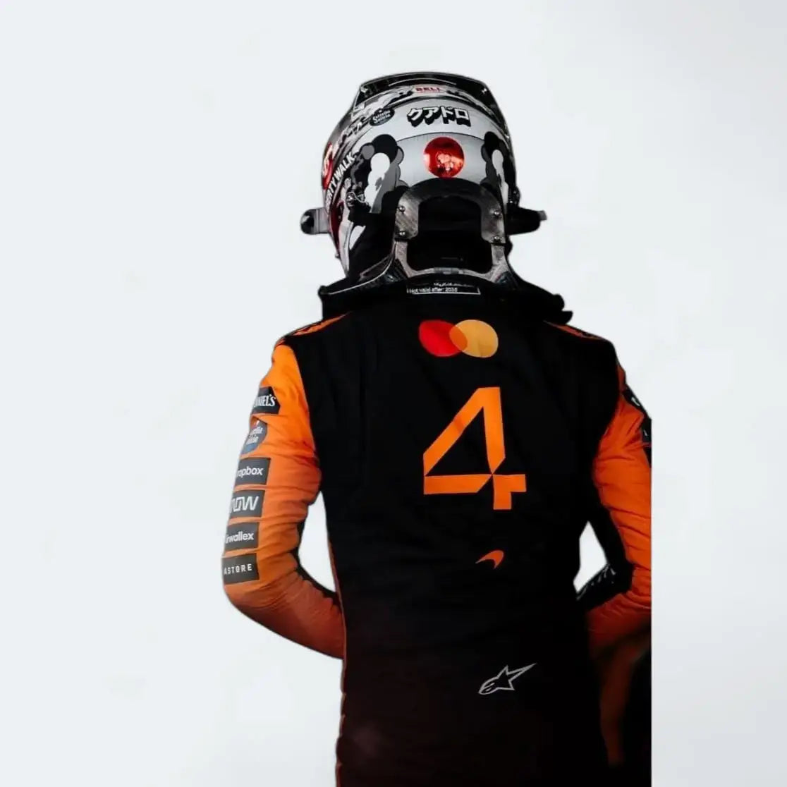 Back of the McLaren 2025 replica racing suit with 'Norris' and car number 4 printed above the McLaren Speedmark logo.