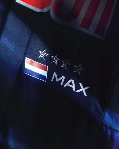 Navy blue fabric with a red, white, and blue star pattern and 'MAX' text.