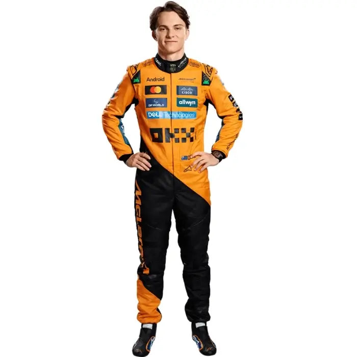 Oscar Piastri wearing the 2025 McLaren F1 Team suit in signature papaya orange, featuring his #81 race number