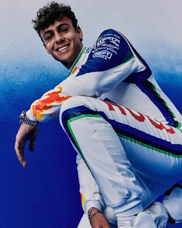 Side angle displaying the suit's technical cut and fabric texture.