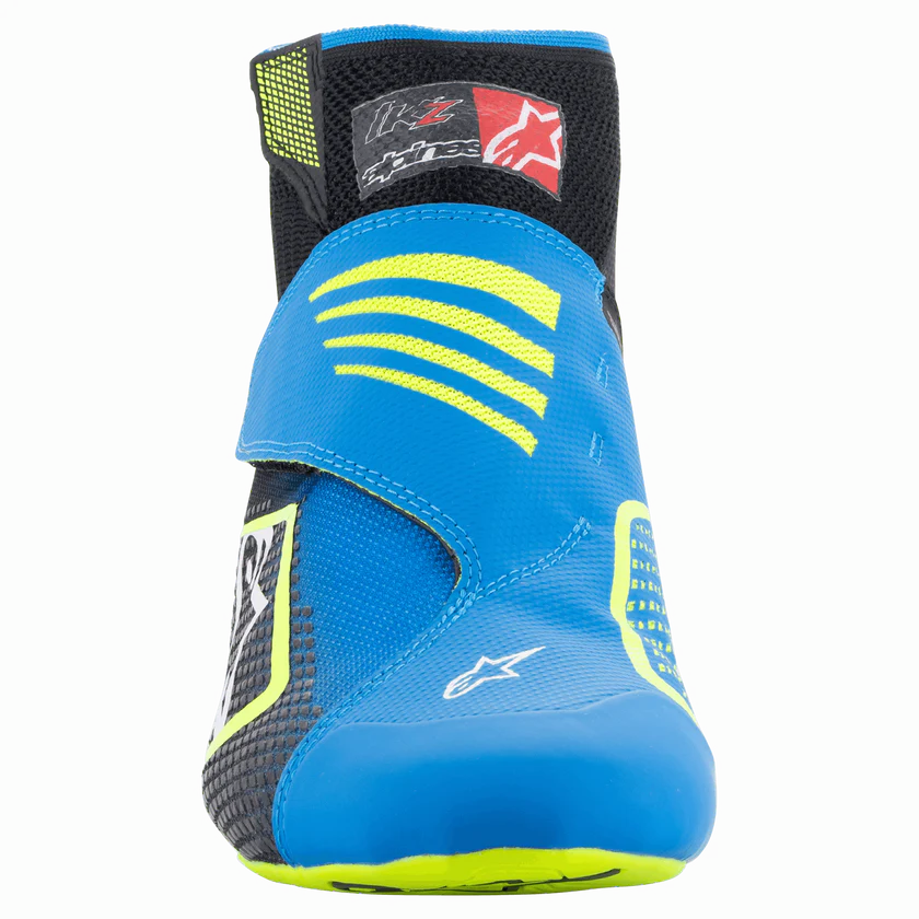 Blue and black racing boot with yellow accents on a white background