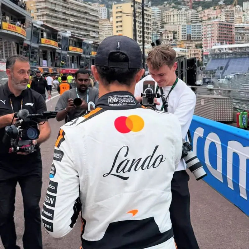 Back view showing Norris name, number 4, and Monaco-specific graphics or crest.